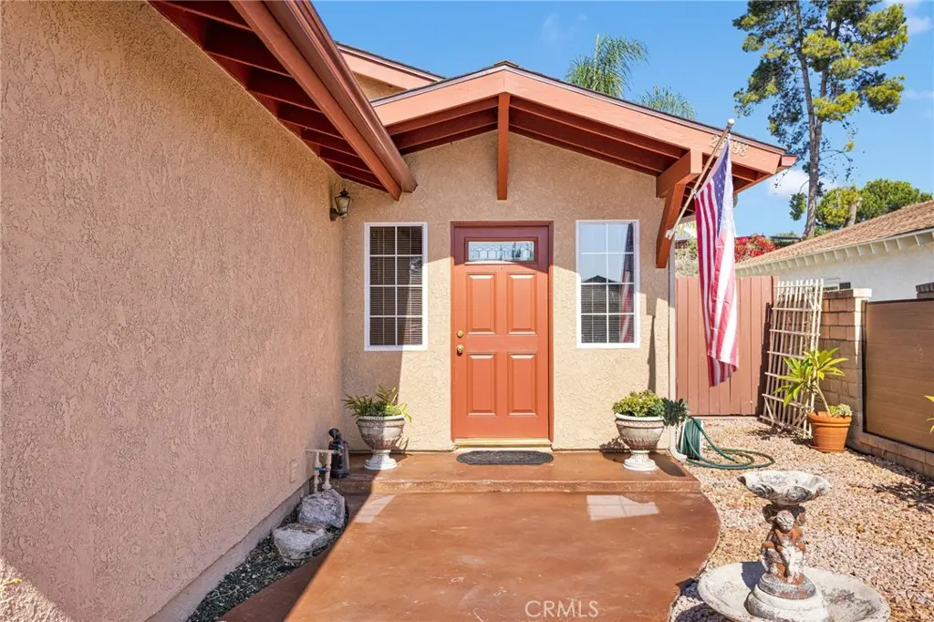 Interior entry with tiled floor and vaulted ceiling