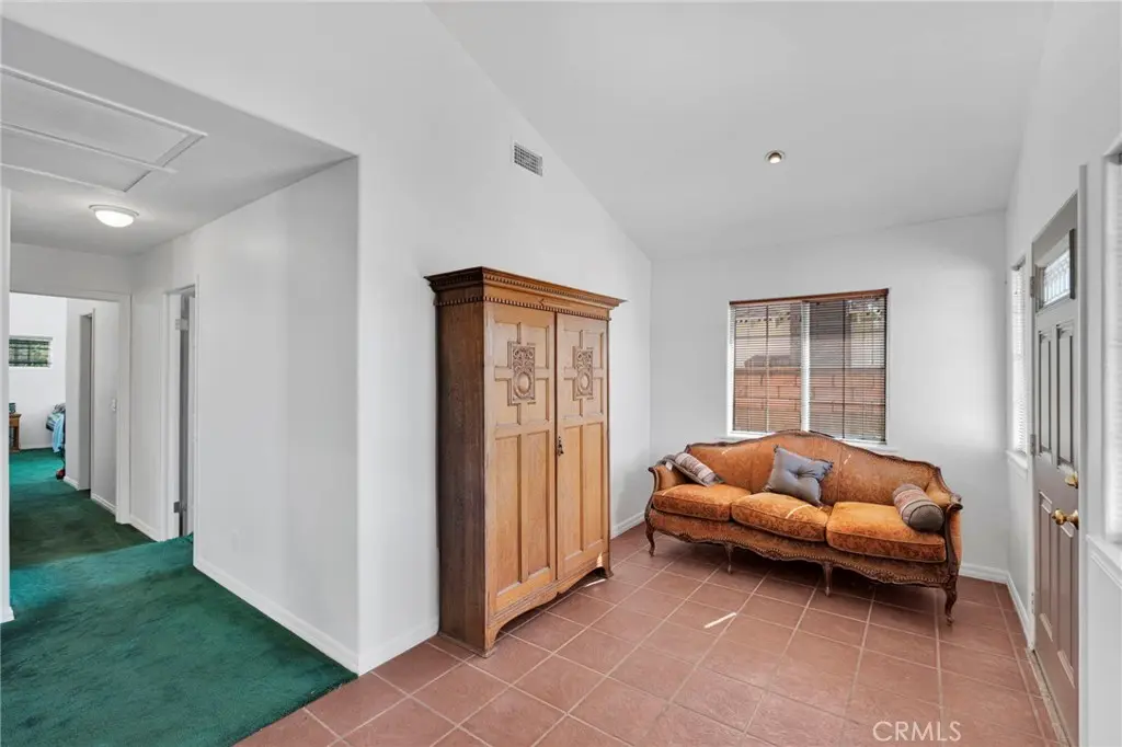 Living area with vaulted ceilings