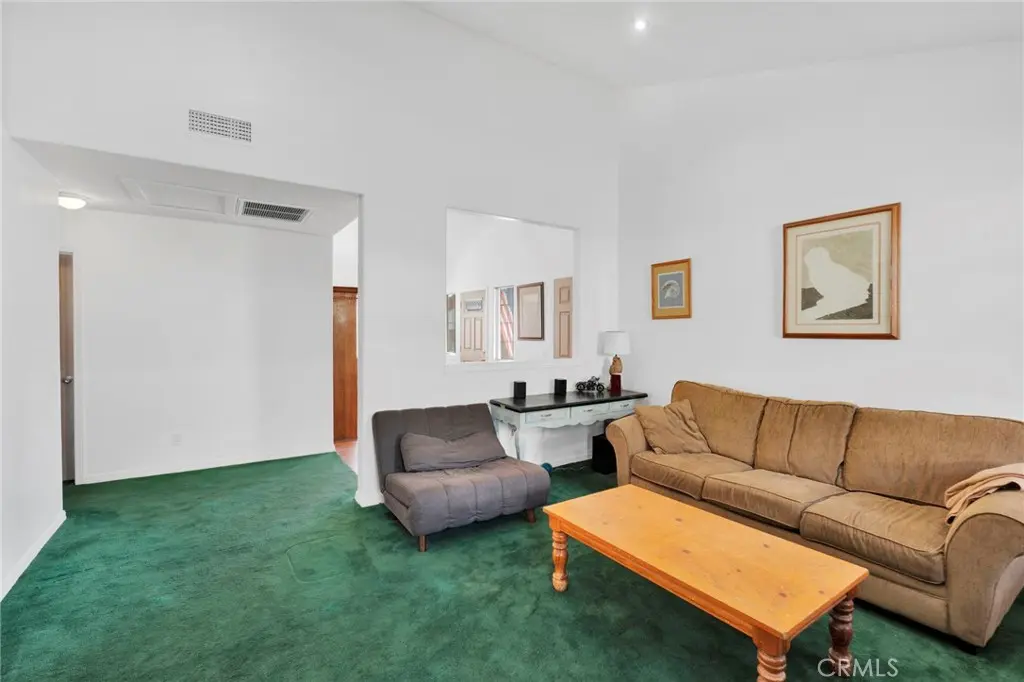Kitchen with wood cabinetry and natural light