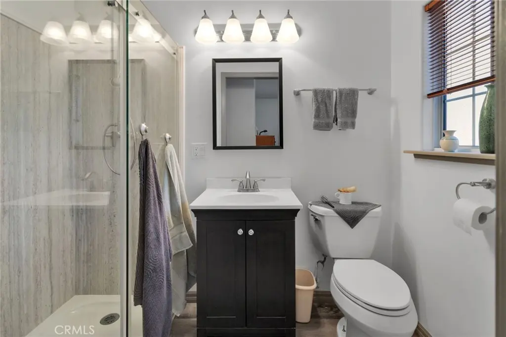 Updated primary bathroom with stone tile
